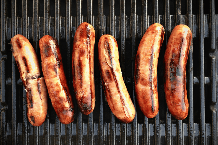 Sausages on a grill