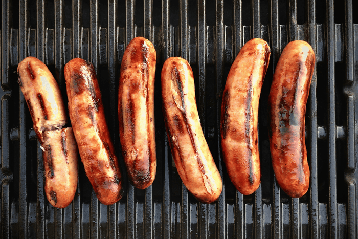 Sausages on a grill