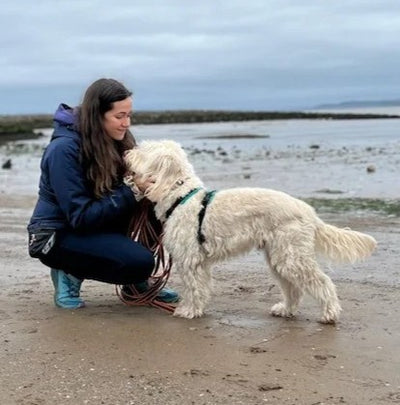 alyssa_ralph_with_dog_on_beach_400x.jpg
