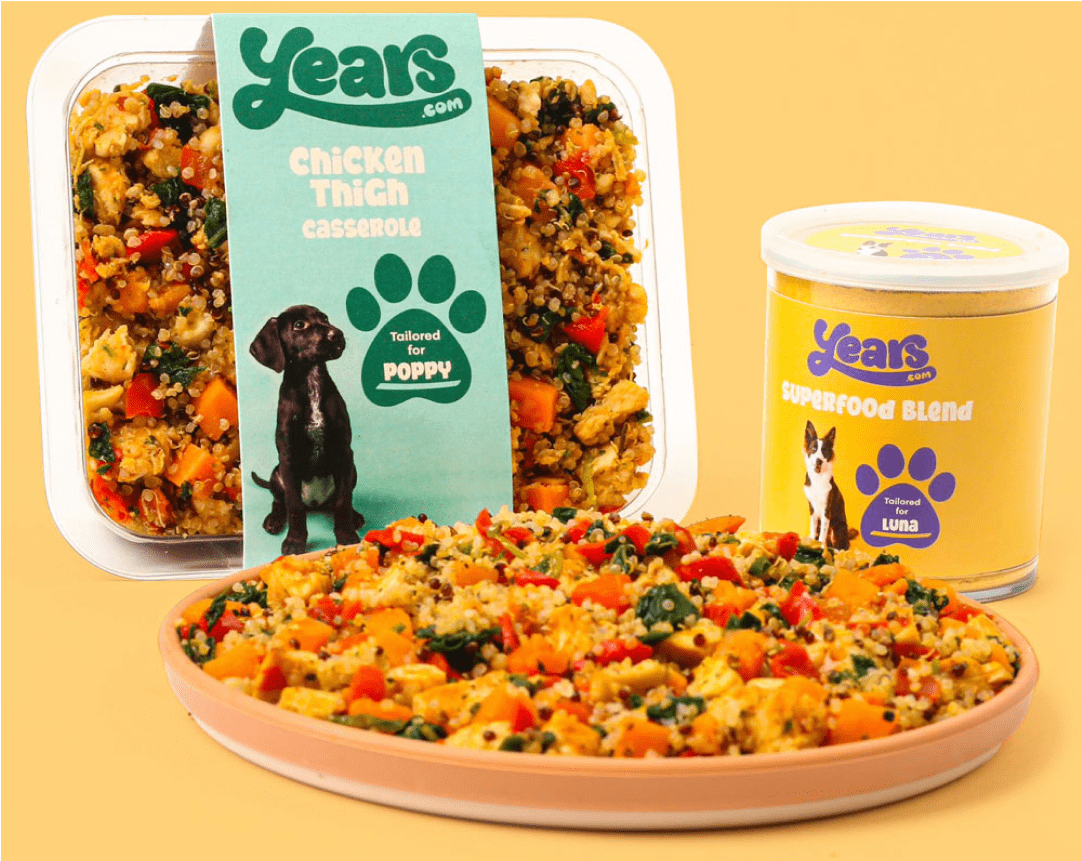 Tailored nutrition for dogs, complete with freshly cooked meal on plate and pot of supplement